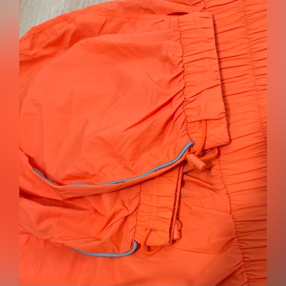 NWT Fabletics High-Waisted Piped Nylon Pant in Passion Orange - Picture 7 of 12